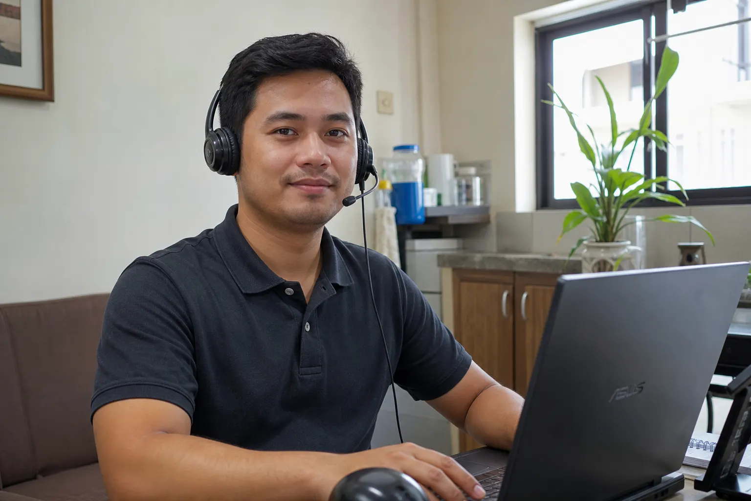 Filipino virtual assistant with headset during a training session.